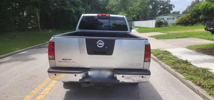 Rear view of the Nissan Titan with an open bed